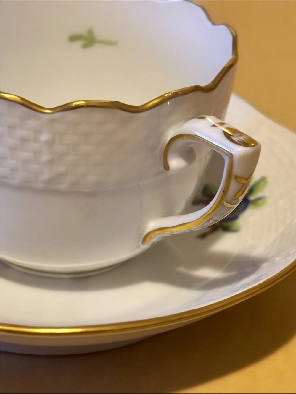 HEREND ETON SMALL PORCELAIN CUP AND SAUCER.